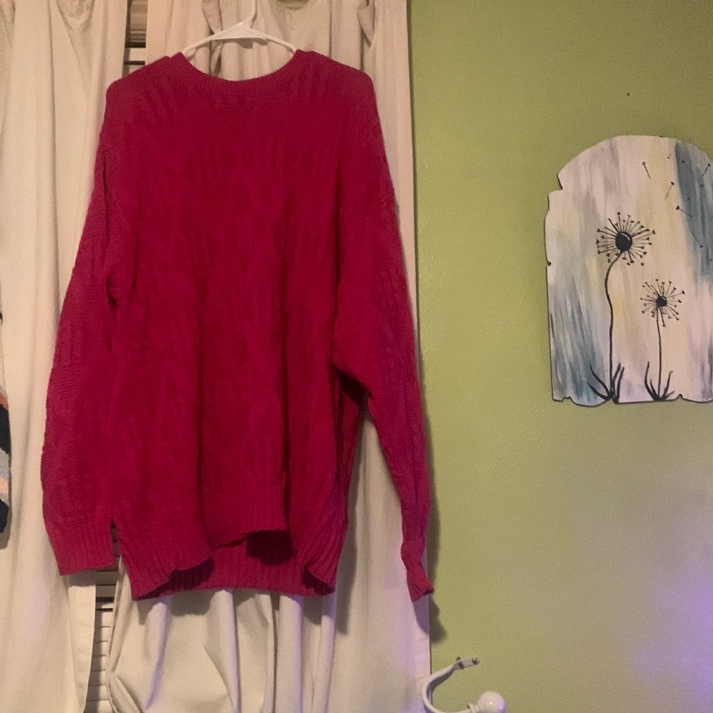 An extra large Magenta sweater